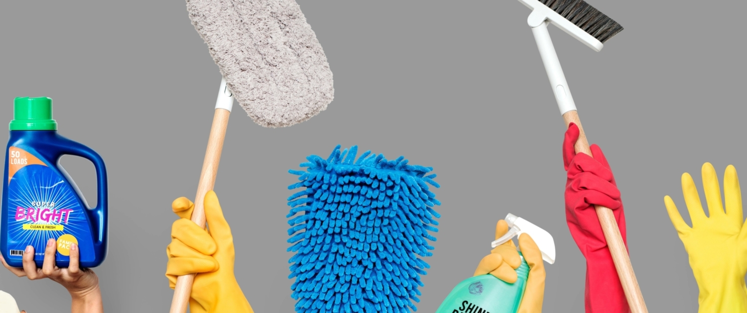 hands-holding-cleaning-tools-solutions
